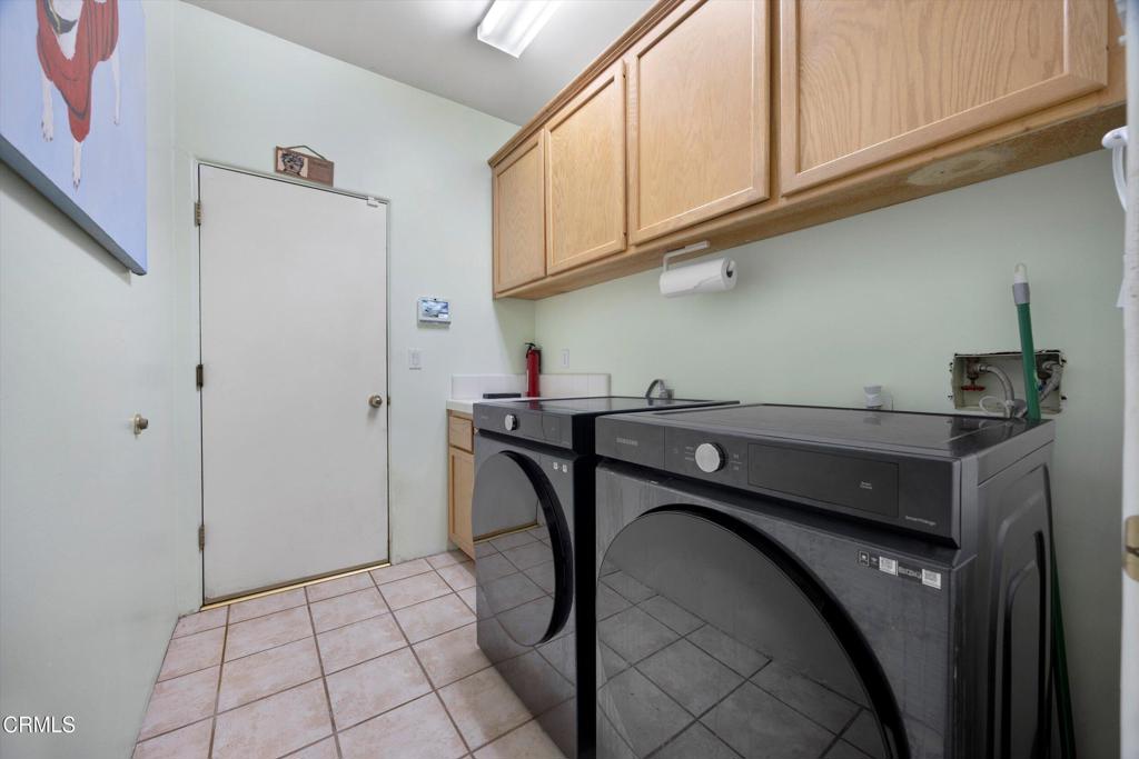 5705 Valley Street Bakersfield, CA 93306 - Photo 42 of 53 a utility room with dryer and washer