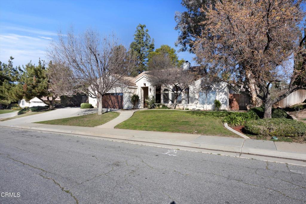 5705 Valley Street Bakersfield, CA 93306 - Photo 10 of 53 a view of road with large trees