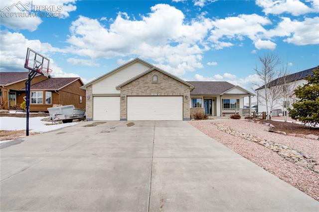 12118 Rio Secco Road Peyton, CO 80831 - Photo 2 of 34 How about we shoot some hoops?
