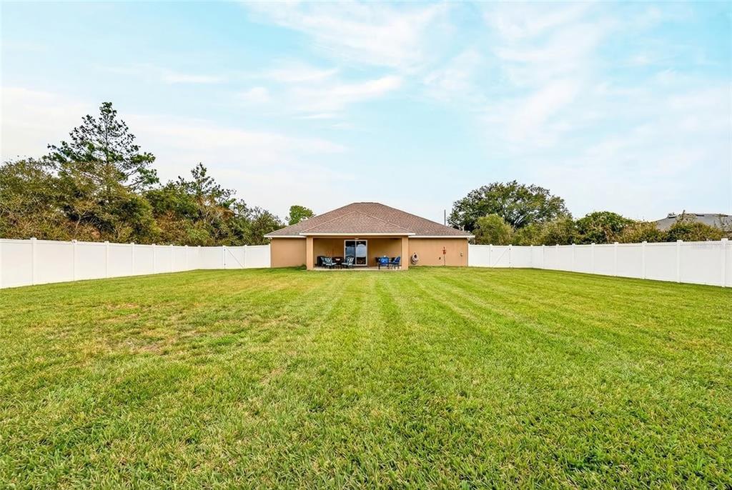 3001 Southwest 173rd Street Road Ocala, FL 34473 - Photo 26 of 28 a view of a large body of water with a yard