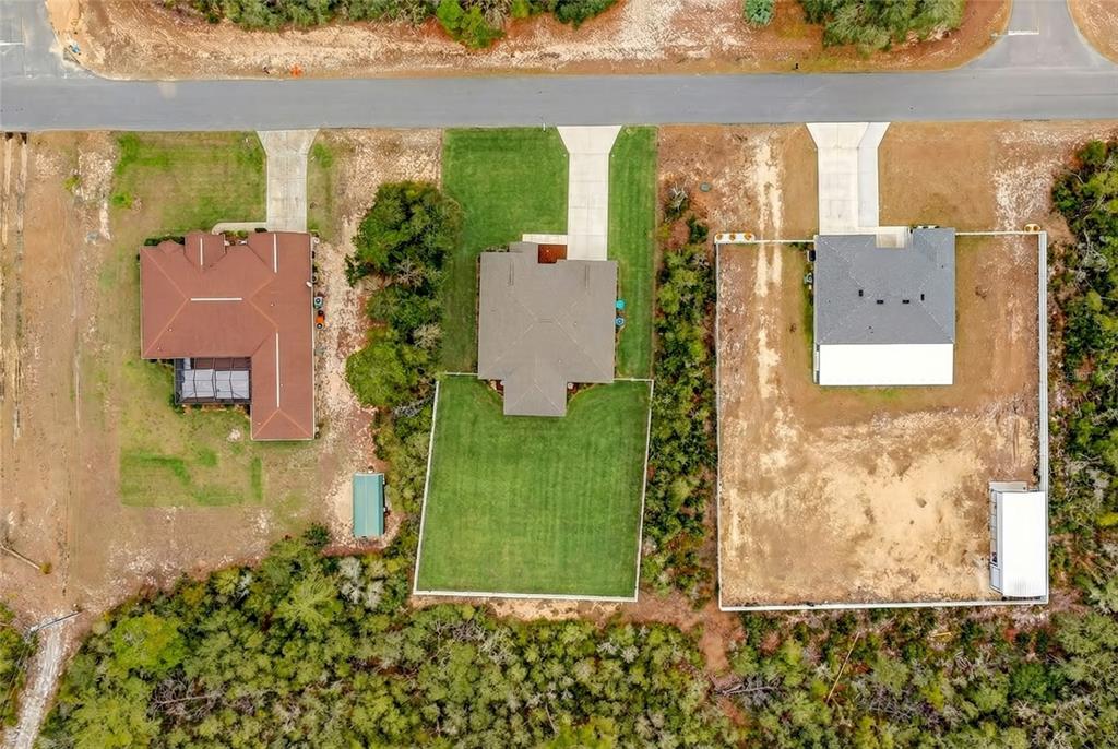 3001 Southwest 173rd Street Road Ocala, FL 34473 - Photo 28 of 28 an aerial view of a house with a yard