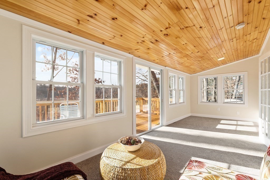 2 Pine Grove Road Westford, MA 01886 - Photo 13 of 27 a spacious bedroom with a bed and wooden floor