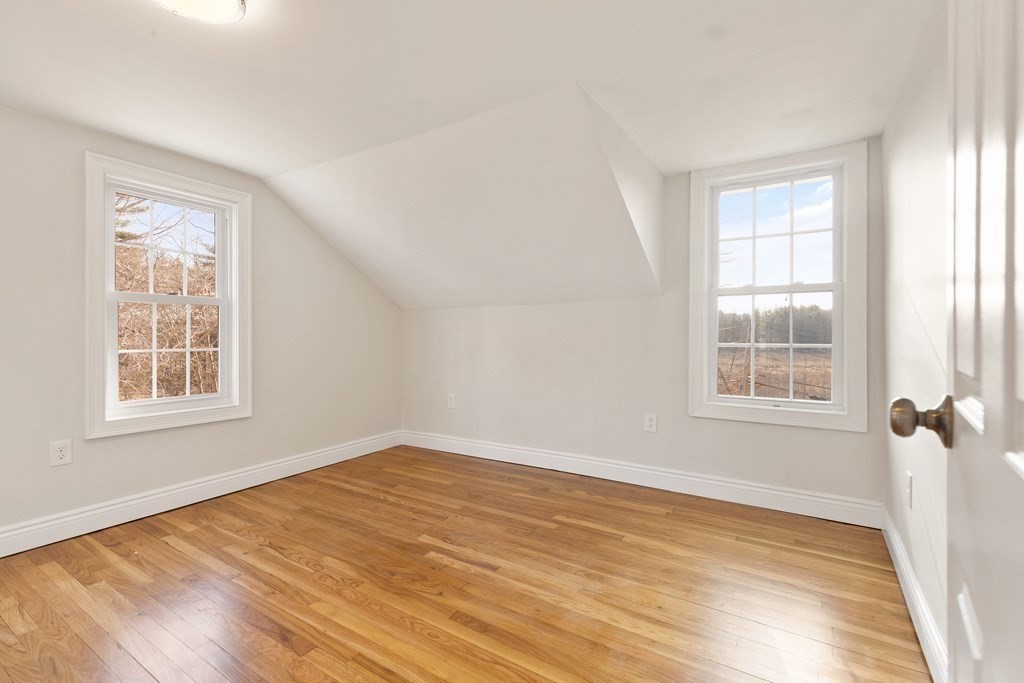 2 Pine Grove Road Westford, MA 01886 - Photo 17 of 27 wooden floor in an empty room with a window