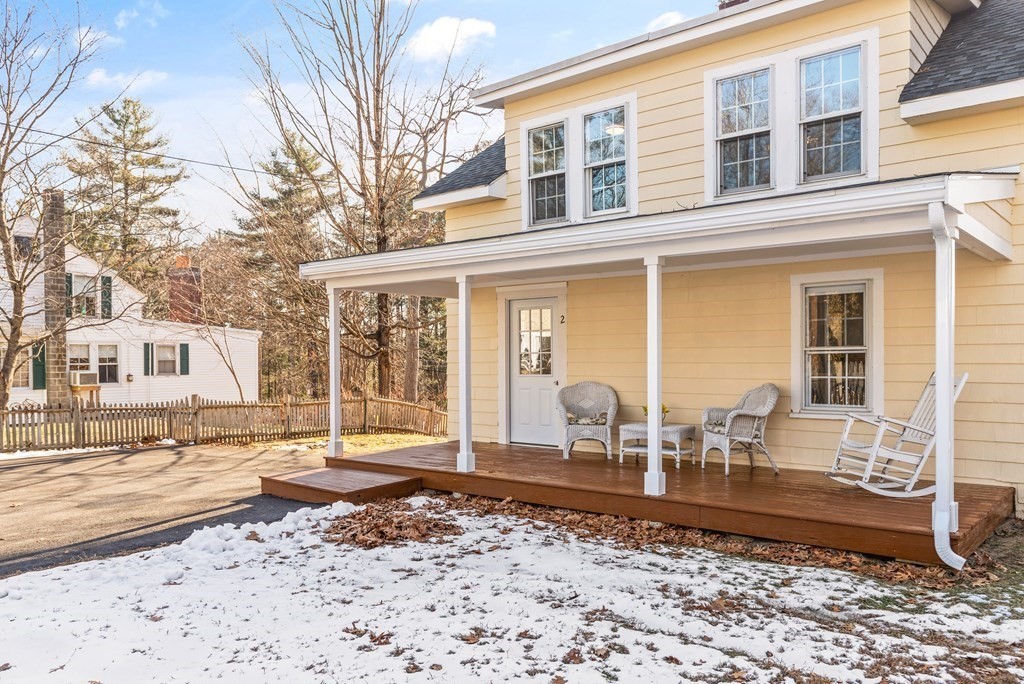 2 Pine Grove Road Westford, MA 01886 - Photo 2 of 27 a front view of a house with outdoor space