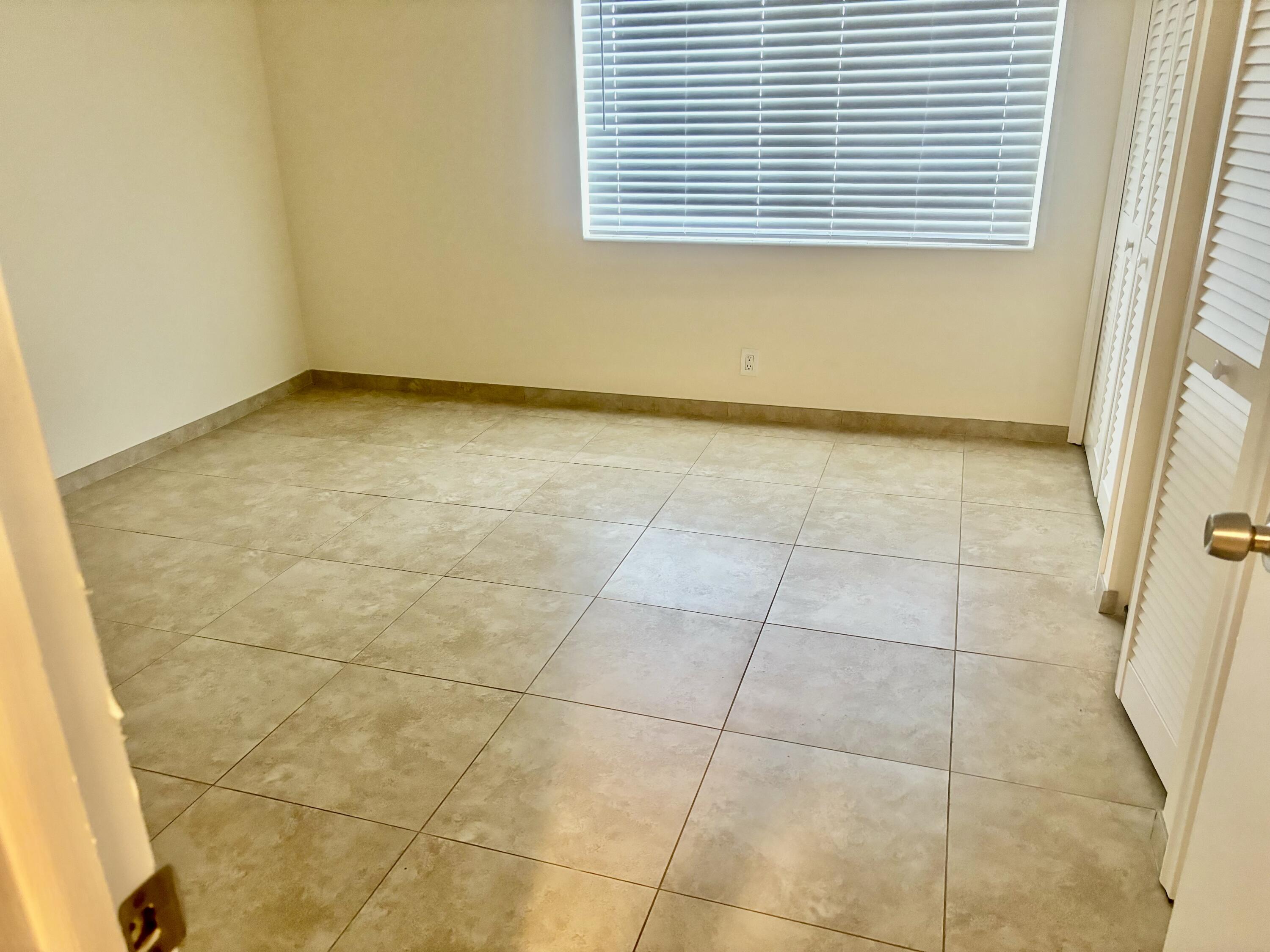 200 Main Boulevard, Unit 2D Boynton Beach, FL 33435 - Photo 15 of 26 a view of a room that has a window