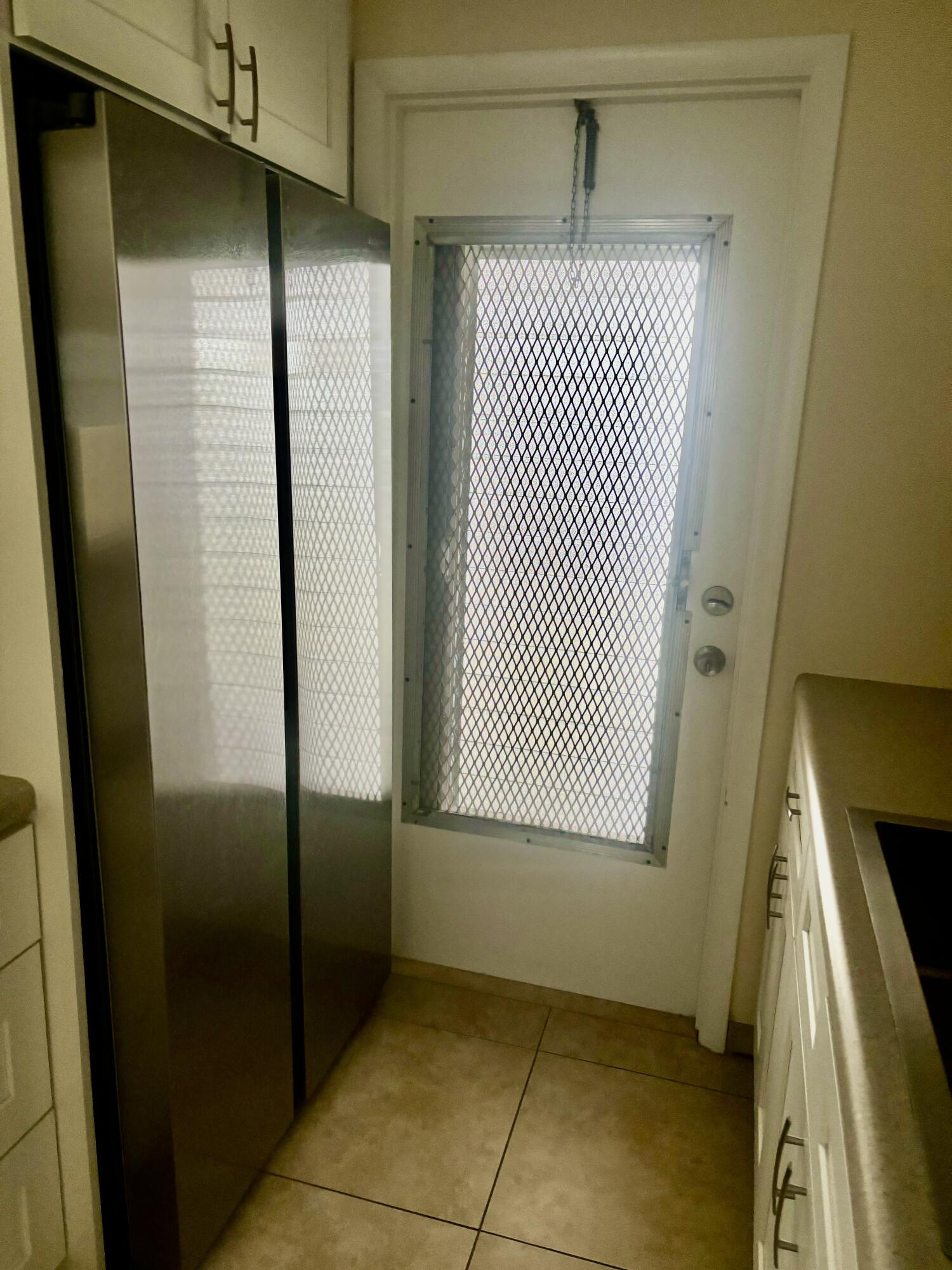 200 Main Boulevard, Unit 2D Boynton Beach, FL 33435 - Photo 7 of 26 a view of an empty room with wooden floor