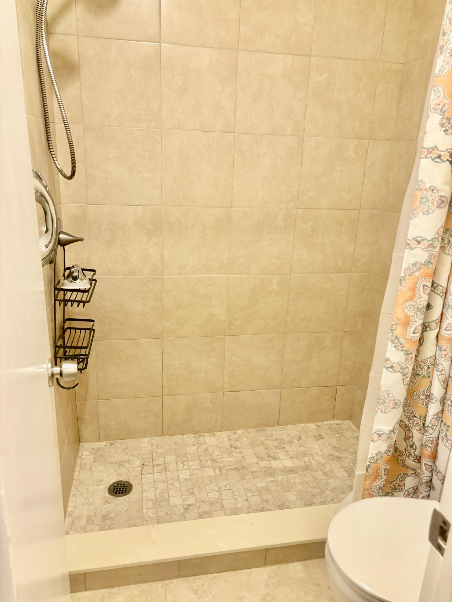200 Main Boulevard, Unit 2D Boynton Beach, FL 33435 - Photo 9 of 26 a bathroom with a shower