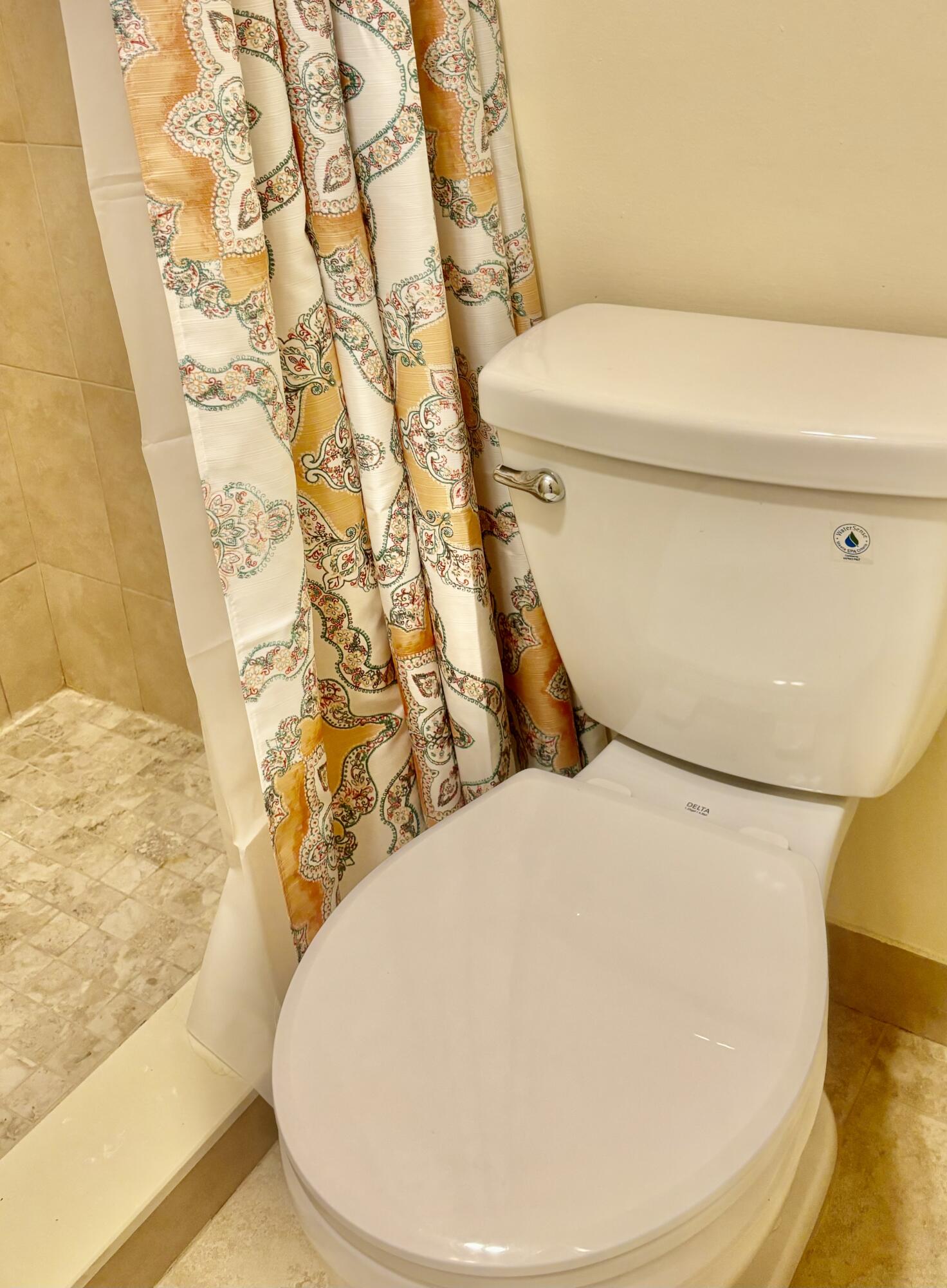 200 Main Boulevard, Unit 2D Boynton Beach, FL 33435 - Photo 10 of 26 a bathroom with a toilet and a sink