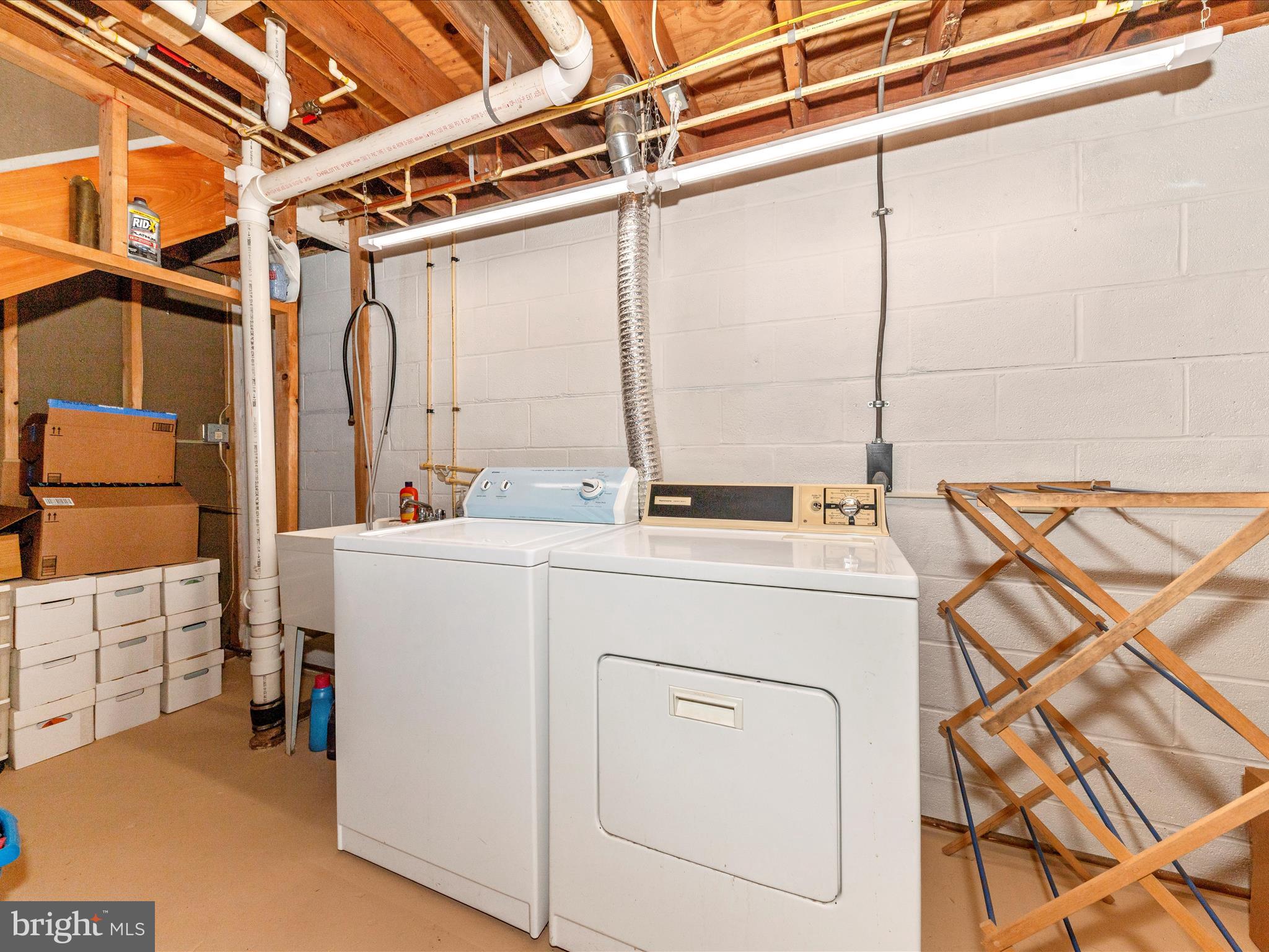 15809 Mt Everest Lane Silver Spring, MD 20906 - Photo 36 of 52 a utility room with a washer and dryer