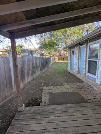 a view of a backyard with a garden