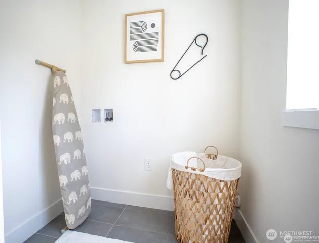 a bathroom with a double vanity sink a and a mirror