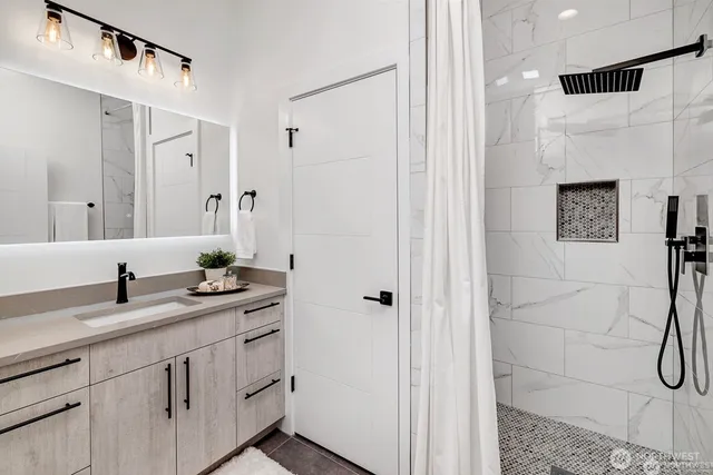 a living room with a potted plant and a window