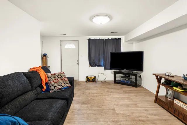 a kitchen with stainless steel appliances granite countertop a stove and a wooden cabinets