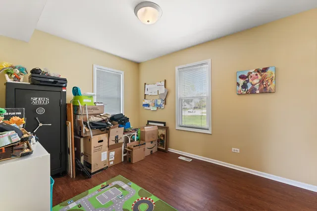 a view of a workspace with furniture and bedroom