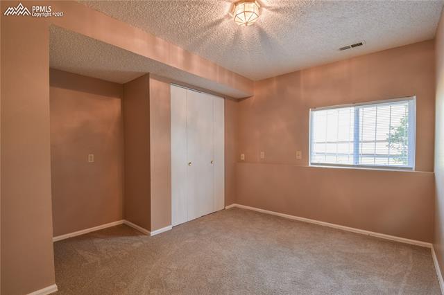616 Wheat Field Road Fountain, CO 80817 - Photo 24 of 32 Bedroom 2