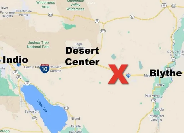 a bathroom with a sink a mirror and a shower curtain