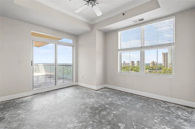 a view of an empty room with a window