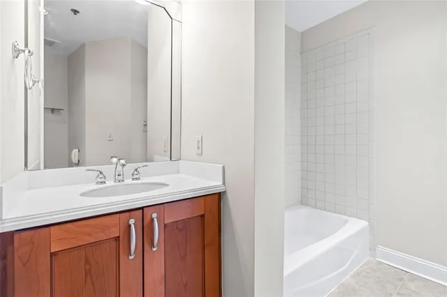 a bathroom with a sink and a bathtub