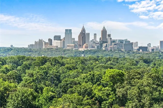 a view of a city with tall buildings in the background
