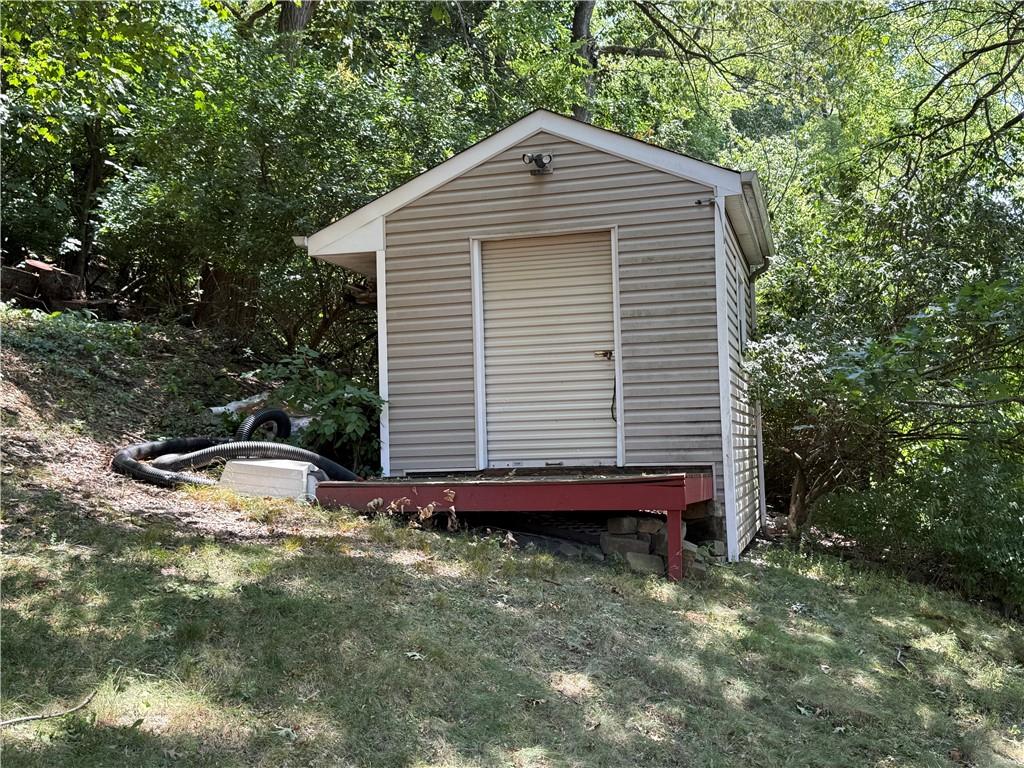 108 Greydon Avenue McKees Rocks, PA 15136 - Photo 6 of 6 a front view of a house with garden
