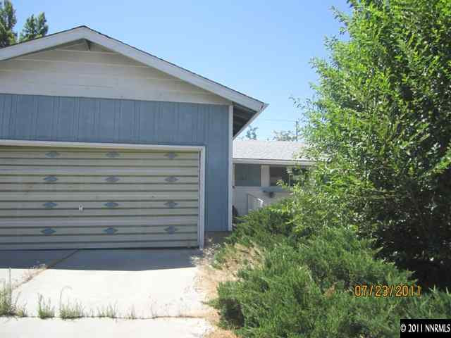 1340 Kings Row Reno, NV 89503 - Photo 1 of 12 a view of a house with a yard