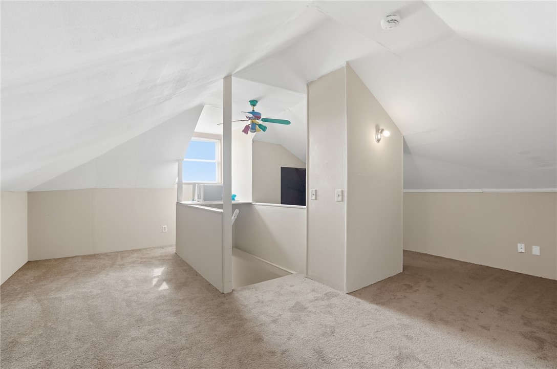 6155 North Union Road Clayton, OH 45315 - Photo 41 of 59 This versatile attic space offers sloped ceilings and soft carpeting, perfect for additional living.