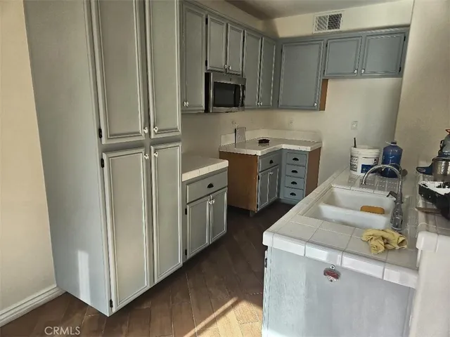 a view of a kitchen from a dining room