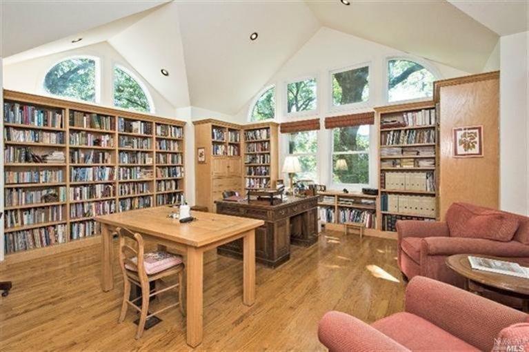 1127 Maple Lane Calistoga, CA 94515 - Photo 1 of 1 a living room with furniture a rug and a large window