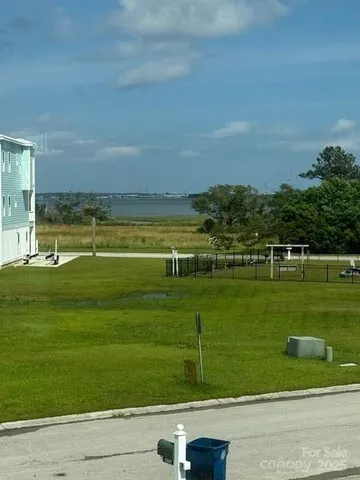 a view of a lake with a city