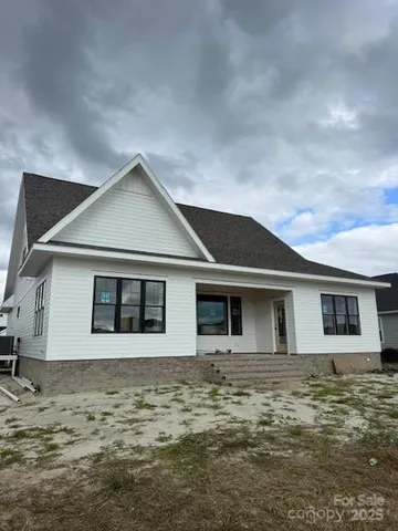 a front view of a house with windows