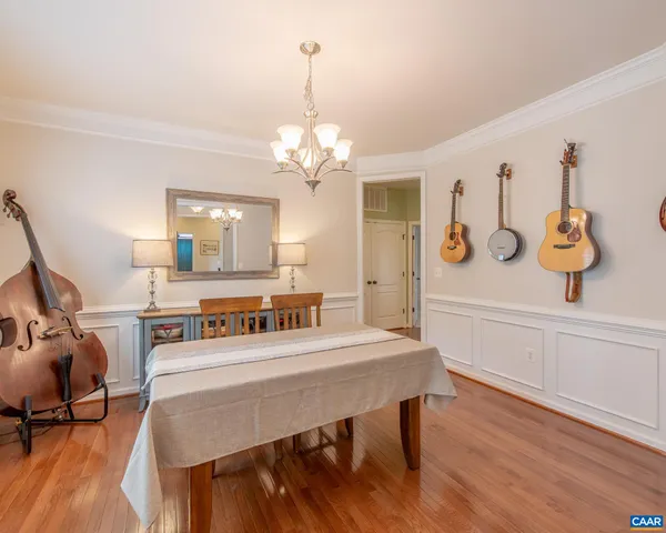 a view of a kitchen with a sink and cabinets