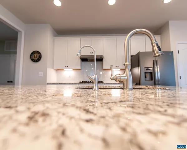 a view of a patio with a dining table and chairs with plants