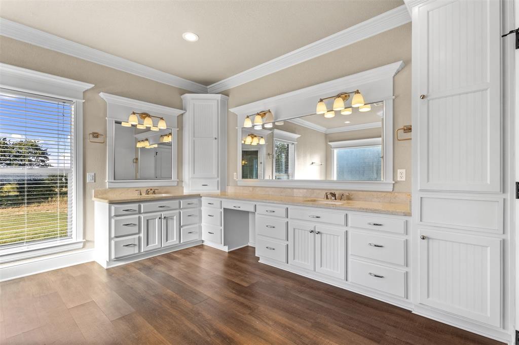 910 County Road 1111 Decatur, TX 76234 - Photo 28 of 40 Bathroom with ornamental molding, vanity, dark wood finished floors, and recessed lighting