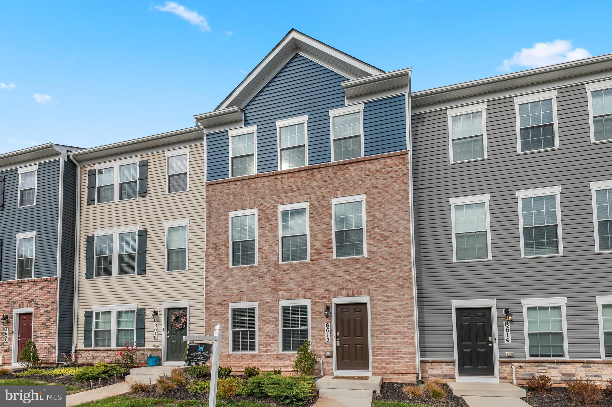 8612 Walter Martz Road Frederick, MD 21702 - Photo 1 of 51 a front view of a building with lot of cars and trees