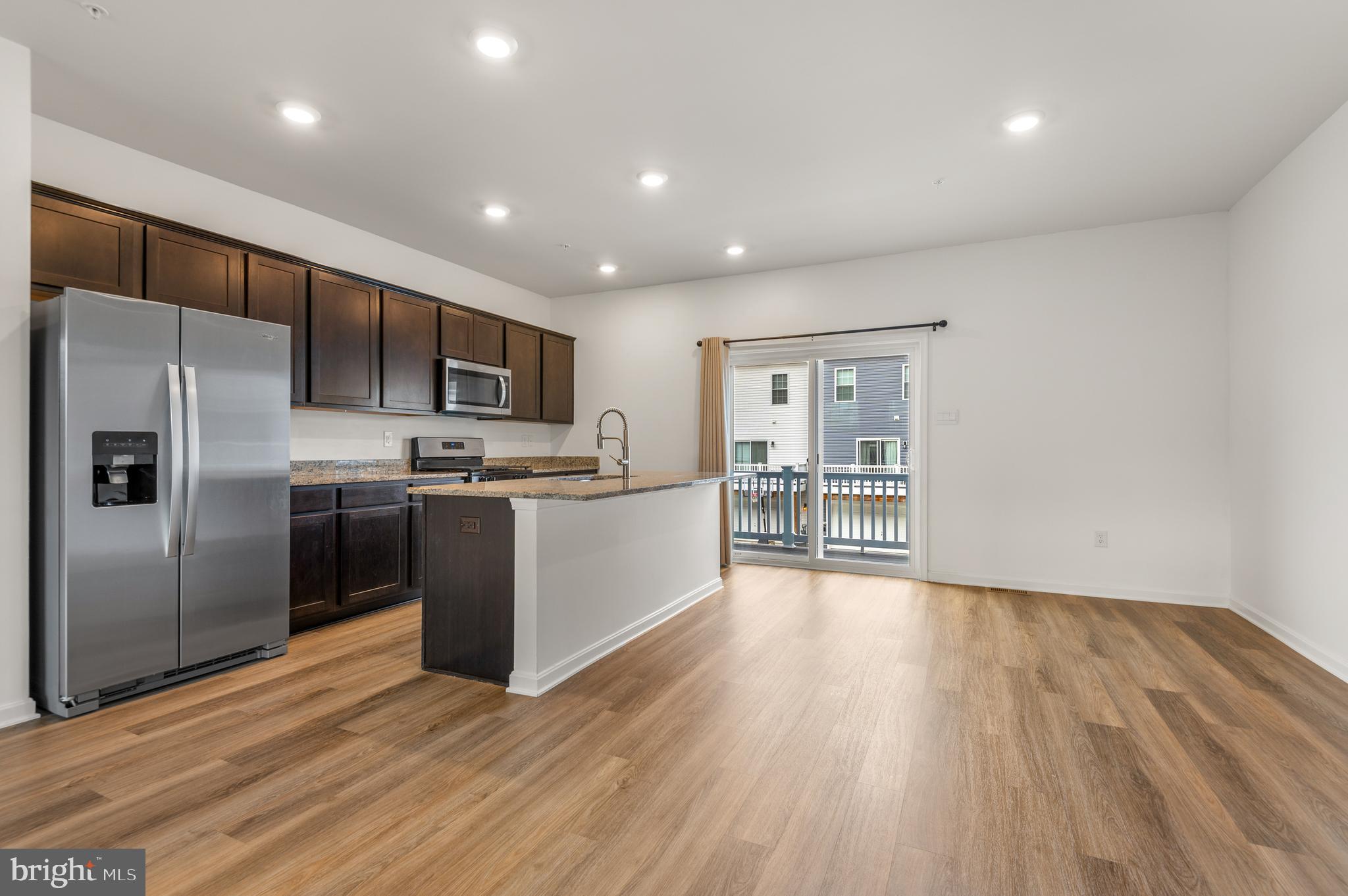 8612 Walter Martz Road Frederick, MD 21702 - Photo 14 of 51 a kitchen with stainless steel appliances a refrigerator and a microwave