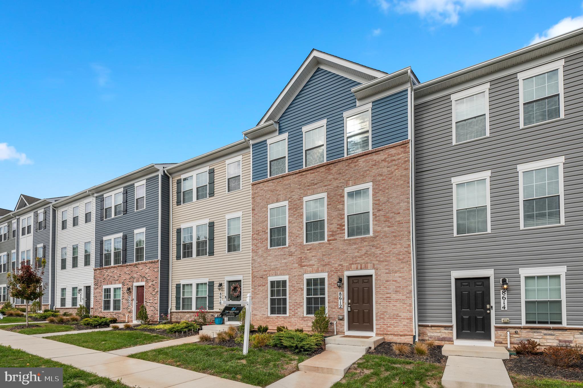 8612 Walter Martz Road Frederick, MD 21702 - Photo 2 of 51 a front view of a building with a yard