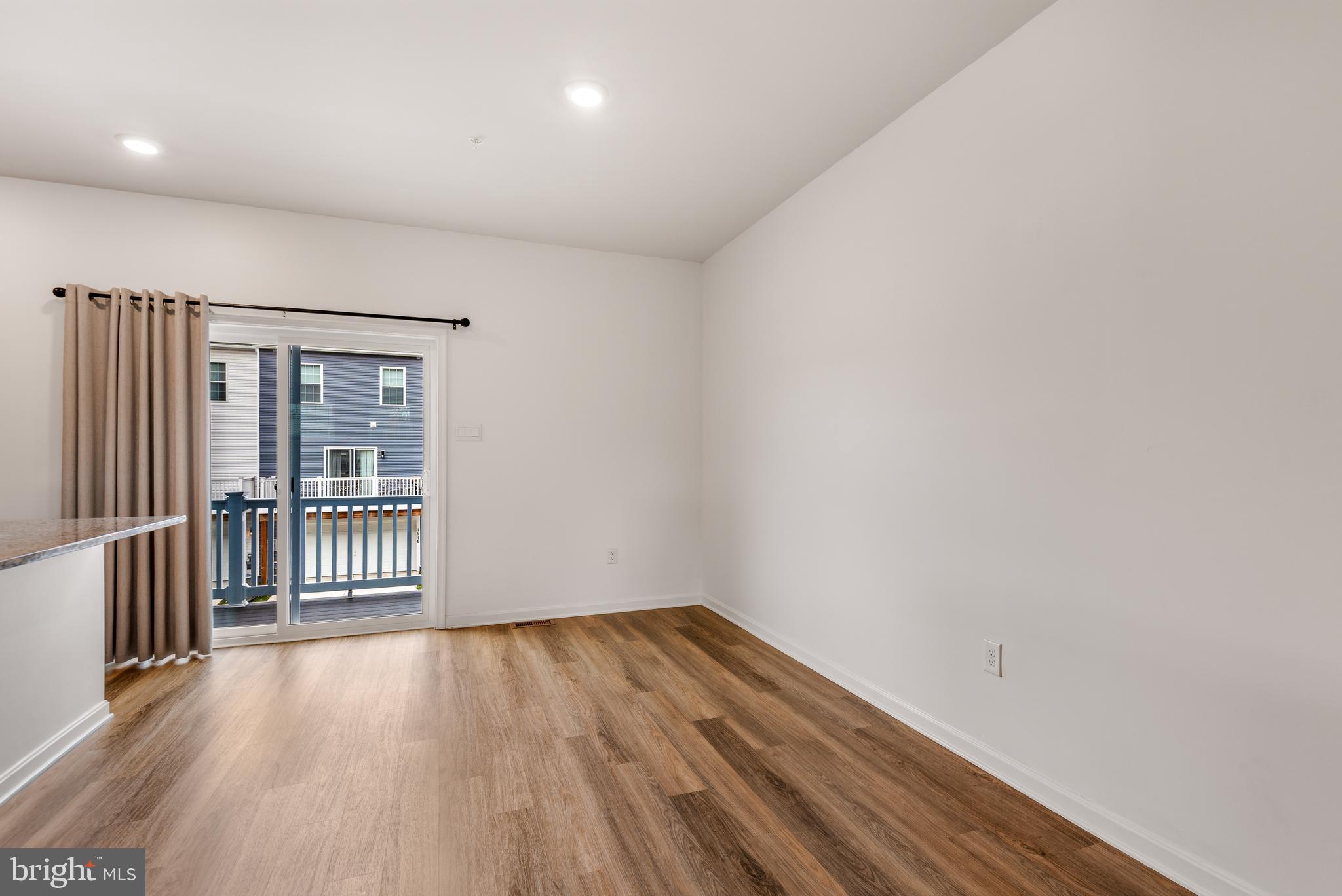 8612 Walter Martz Road Frederick, MD 21702 - Photo 22 of 51 a view of a room with wooden floor and a gate