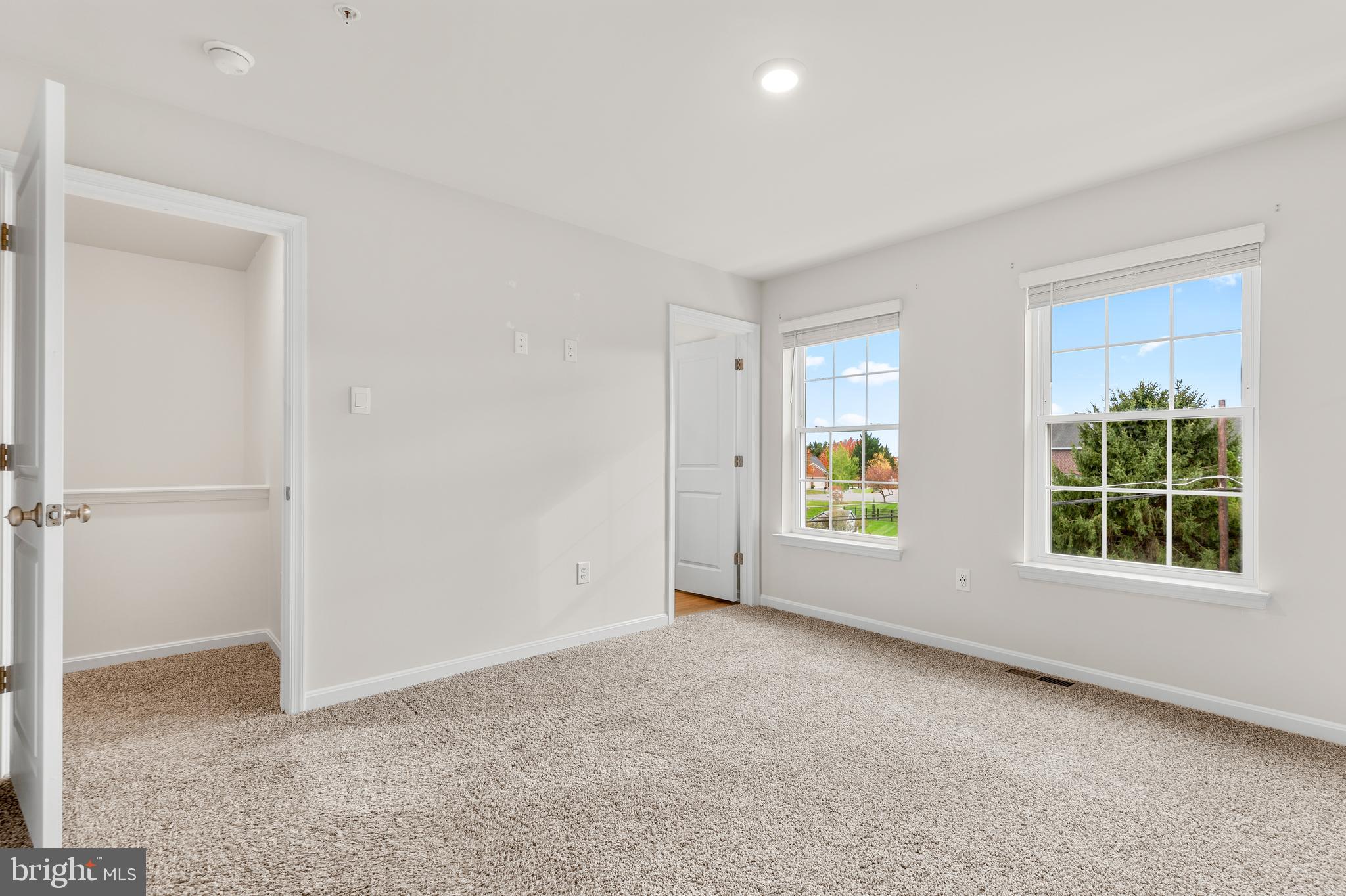 8612 Walter Martz Road Frederick, MD 21702 - Photo 26 of 51 an empty room with windows and mirror
