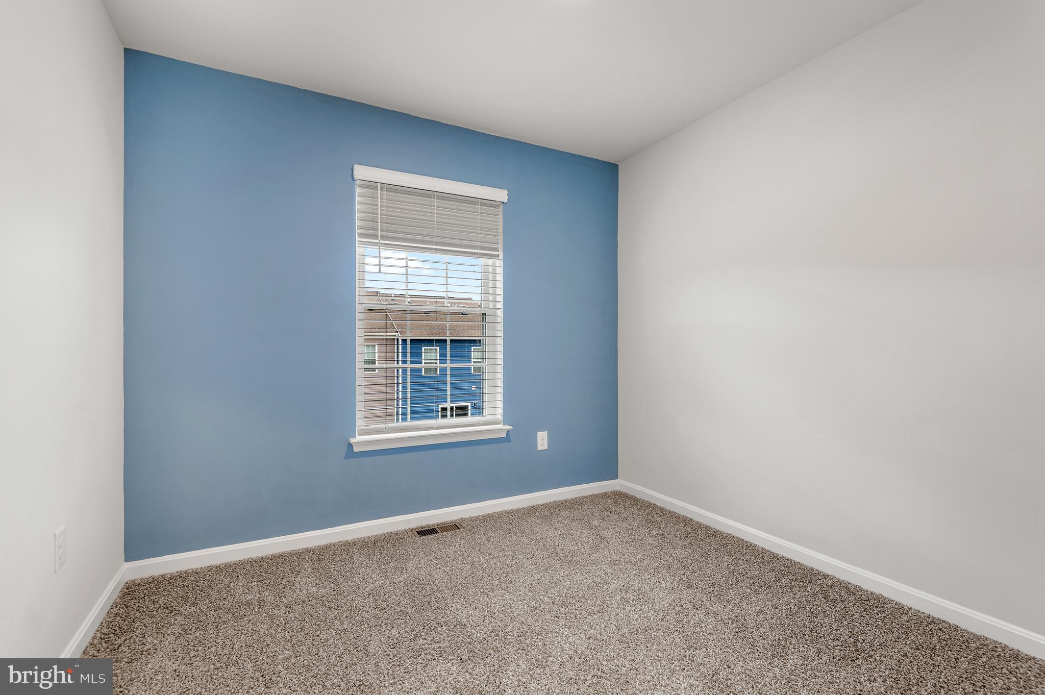 8612 Walter Martz Road Frederick, MD 21702 - Photo 31 of 51 a view of an empty room with a window