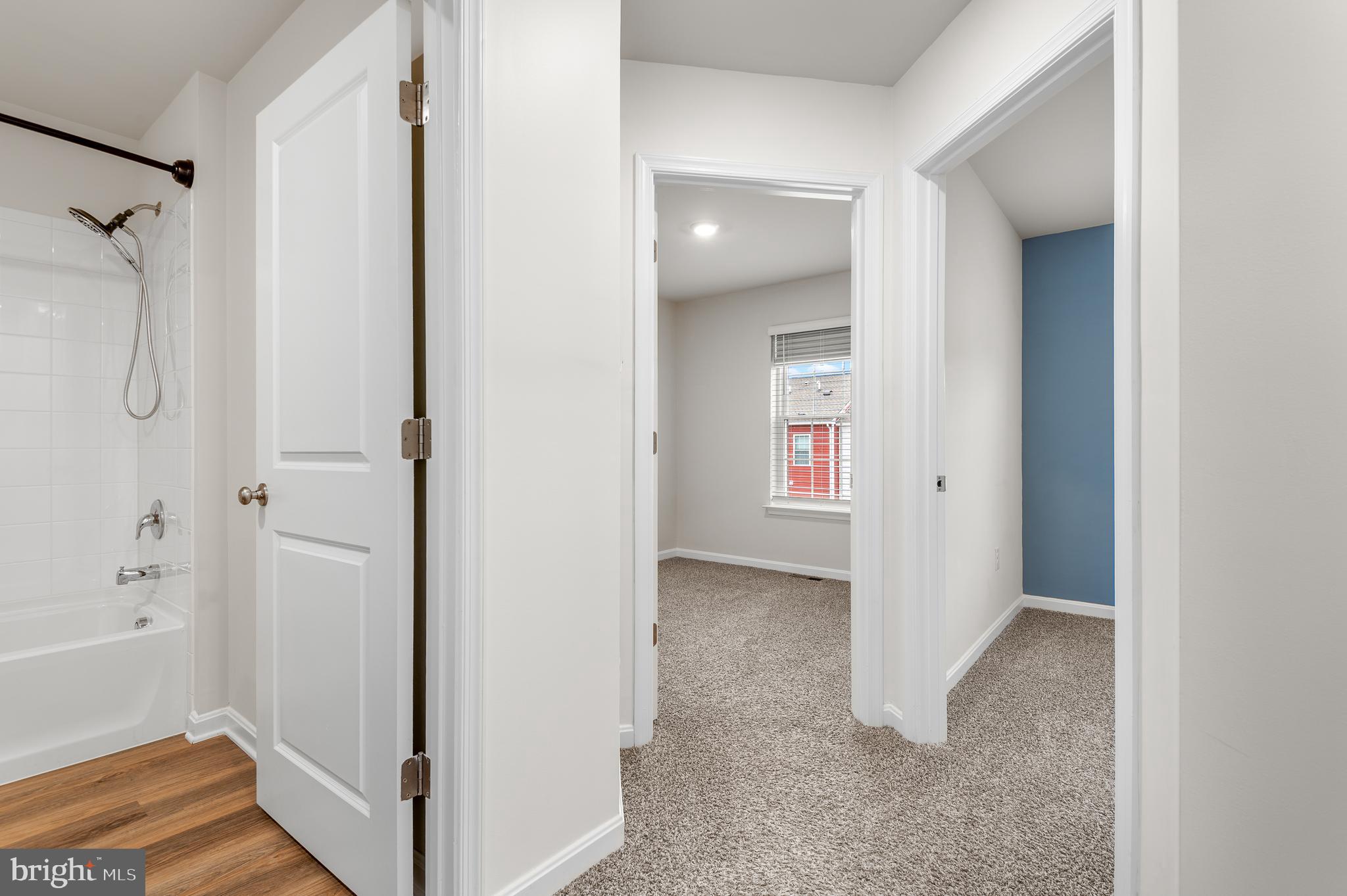 8612 Walter Martz Road Frederick, MD 21702 - Photo 35 of 51 a view of a bathroom from a hallway