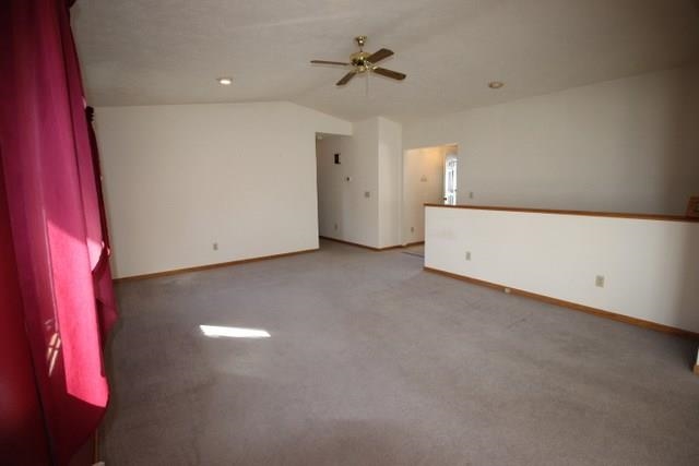 2320 Lake Summerset Road Davis, IL 61019 - Photo 11 of 19 a view of a livingroom with a ceiling fan and window