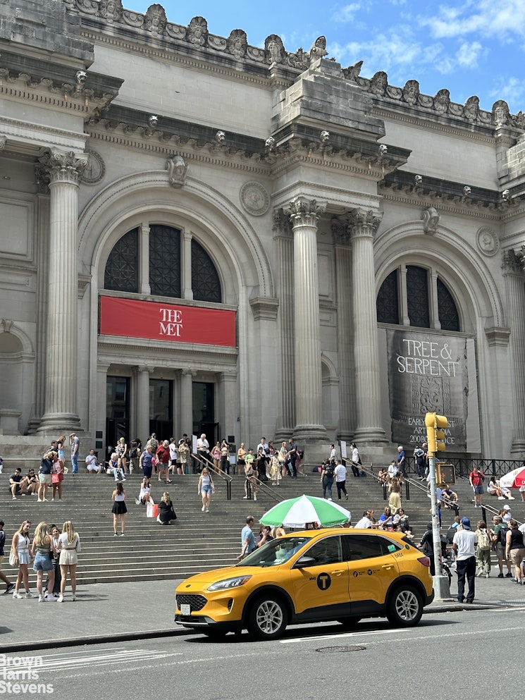 64 East 86th Street, Unit 12AB Manhattan, NY 10028 - Photo 11 of 15 a car parked in front of a building