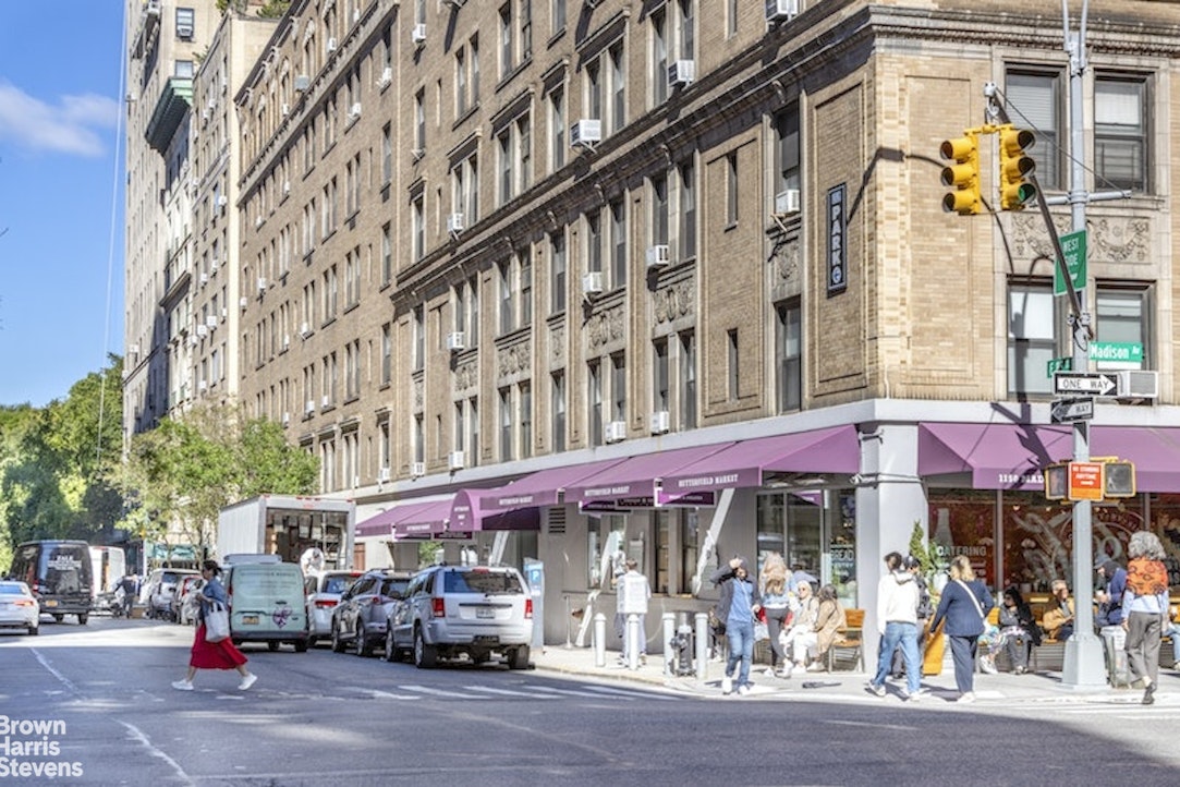 64 East 86th Street, Unit 12AB Manhattan, NY 10028 - Photo 12 of 15 a front view of a building with street