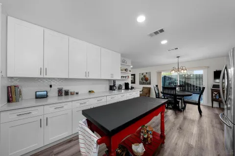 a view of a kitchen and dining room