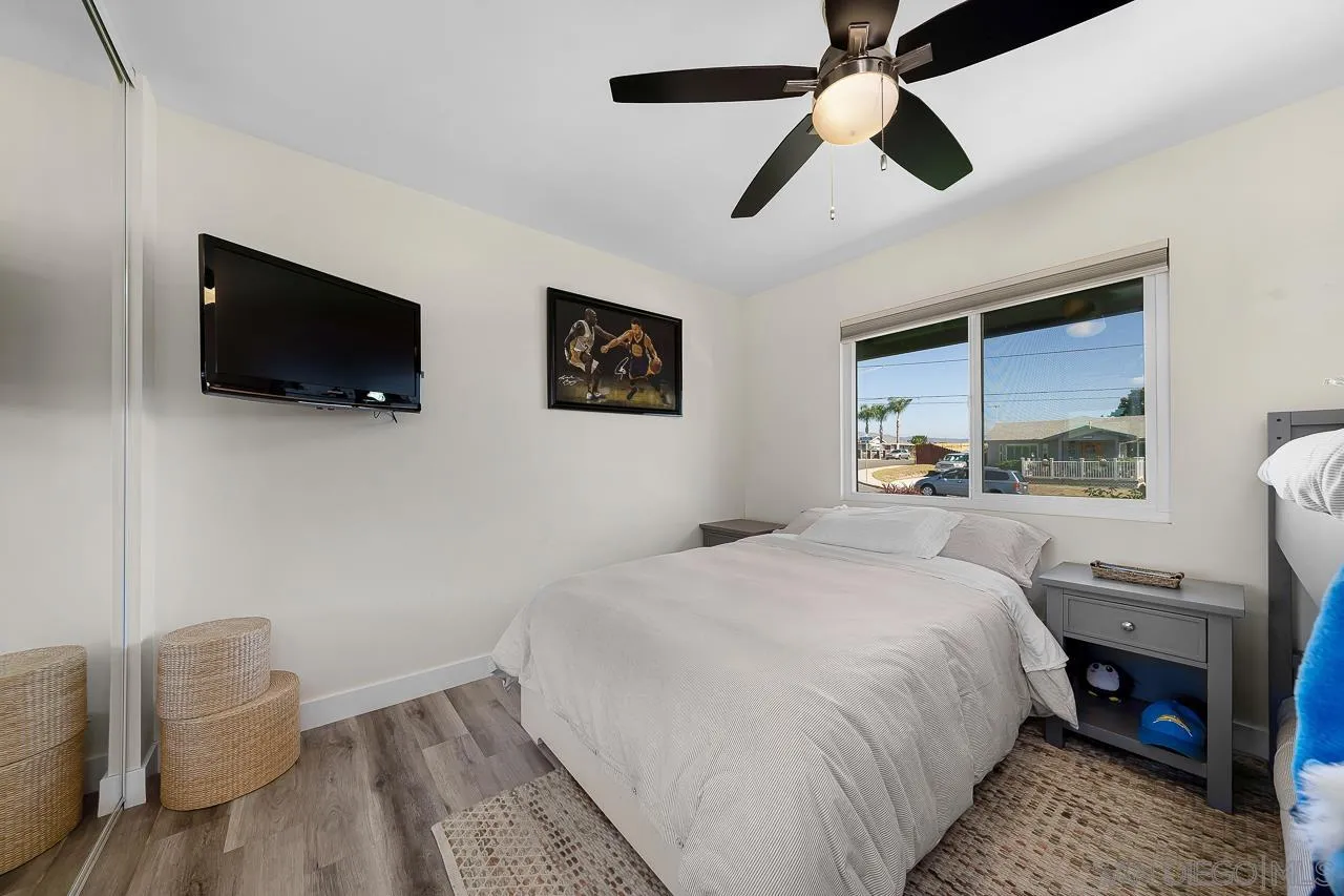 1761 Harvard Street Chula Vista, CA 91913 - Photo 20 of 41 a bedroom with a bed and a flat screen tv