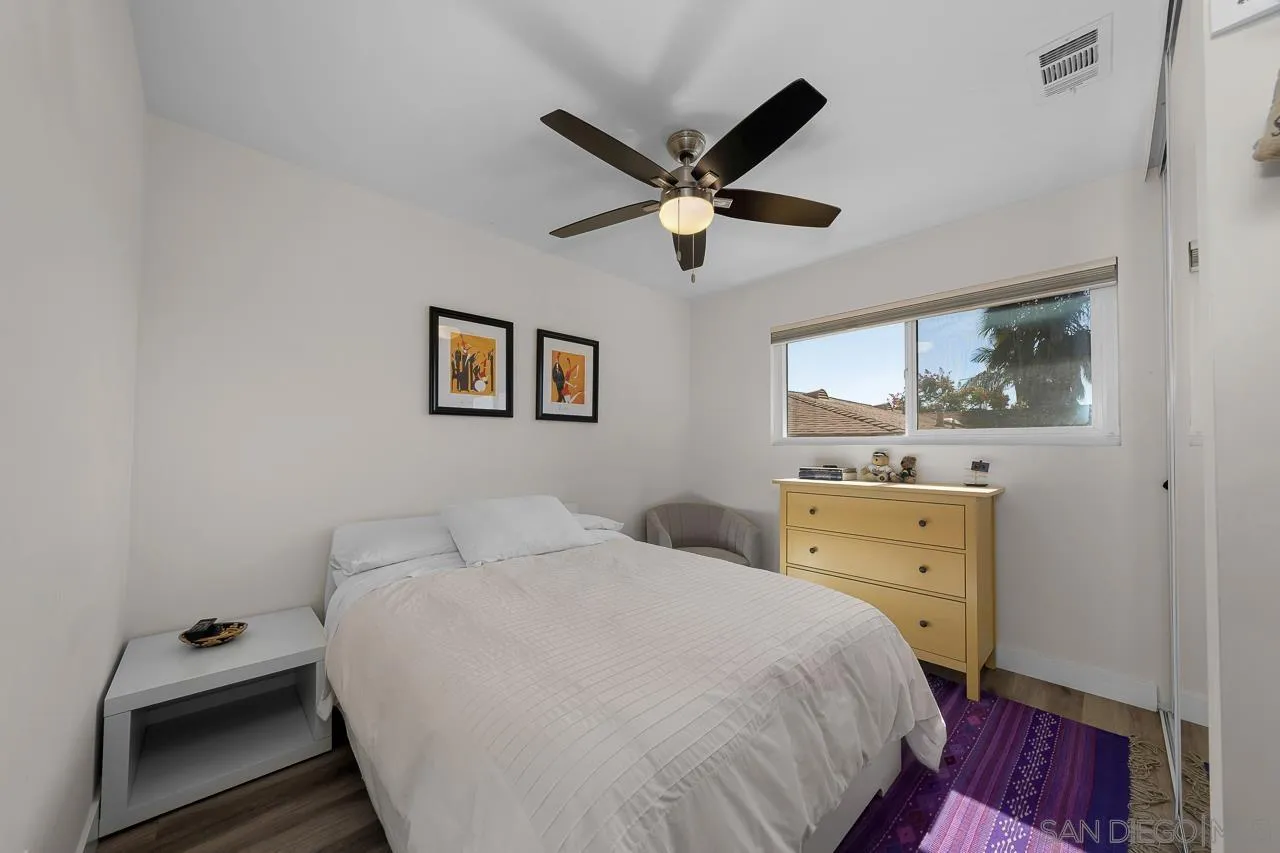 1761 Harvard Street Chula Vista, CA 91913 - Photo 26 of 41 a bedroom with a bed and a dresser