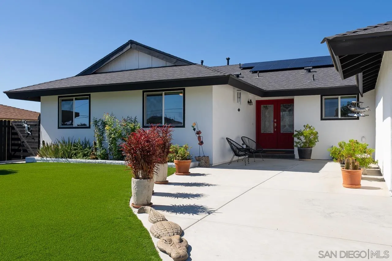 1761 Harvard Street Chula Vista, CA 91913 - Photo 3 of 41 a front view of a house with garden