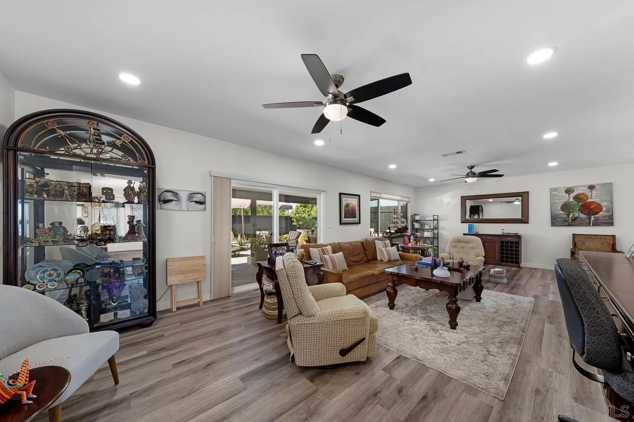1761 Harvard Street Chula Vista, CA 91913 - Photo 5 of 41 a living room with furniture and a large window