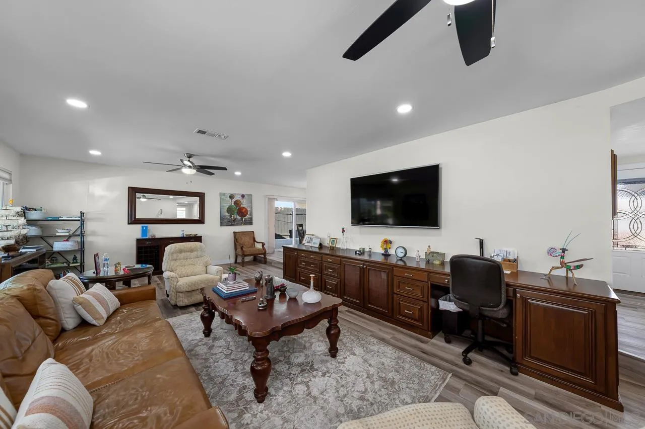 1761 Harvard Street Chula Vista, CA 91913 - Photo 6 of 41 a living room with furniture and a flat screen tv
