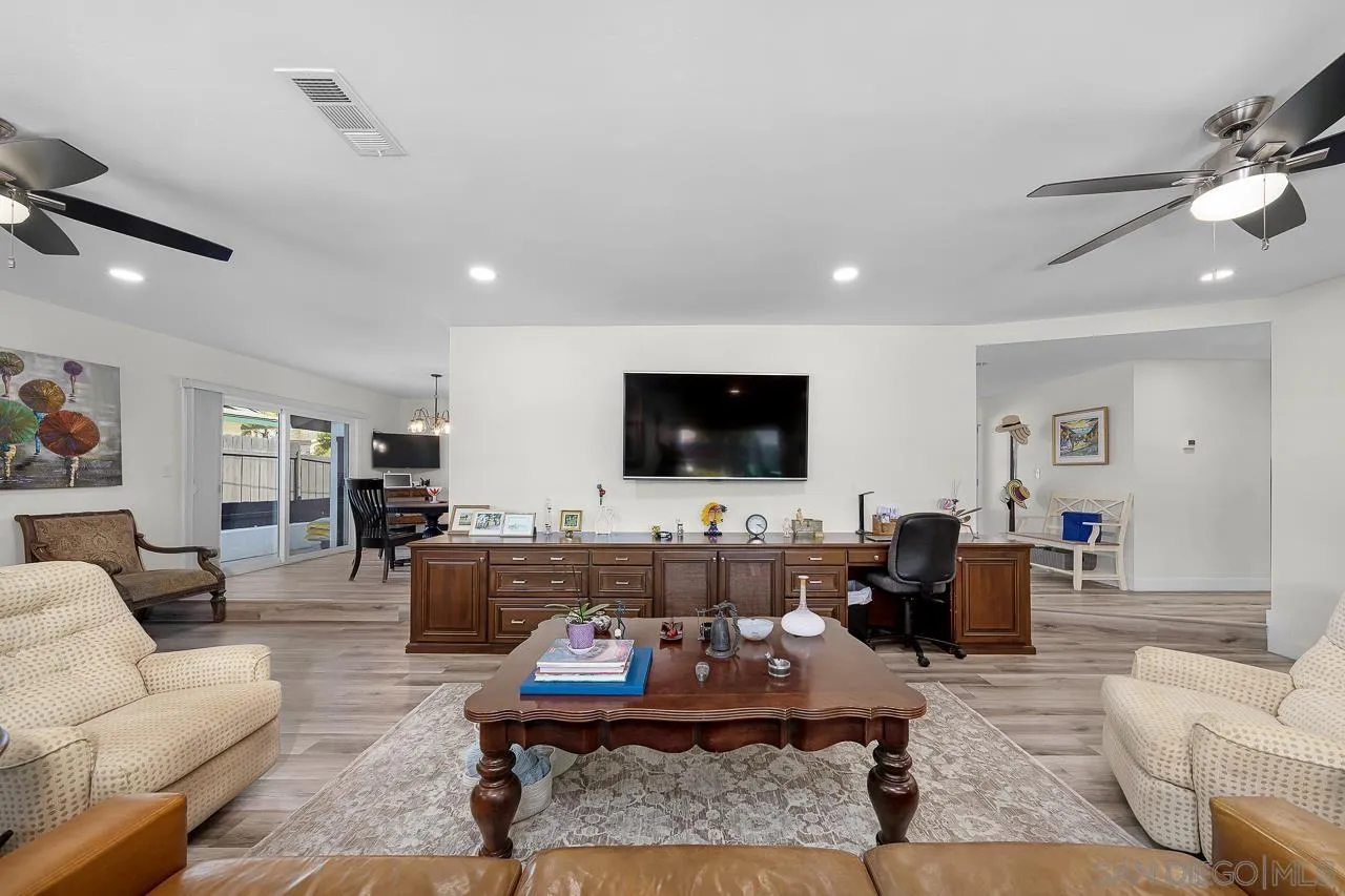 1761 Harvard Street Chula Vista, CA 91913 - Photo 7 of 41 a living room with furniture and a flat screen tv